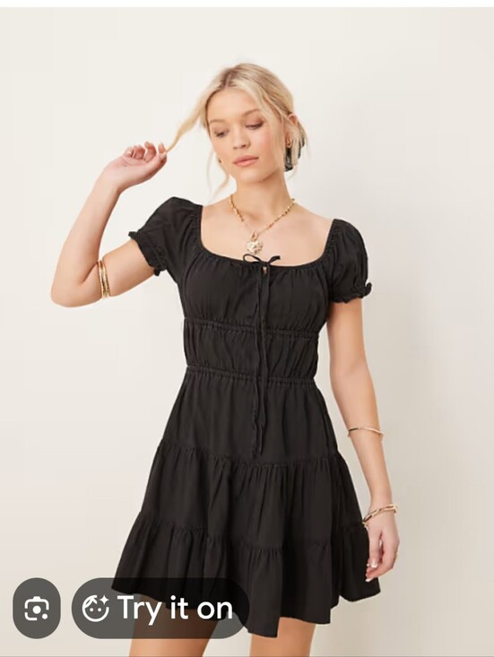 The Unbranded Brand Dresses & Skirts - Black Tiered Short-Sleeve Dress with Tie Neck by Unknown Size L